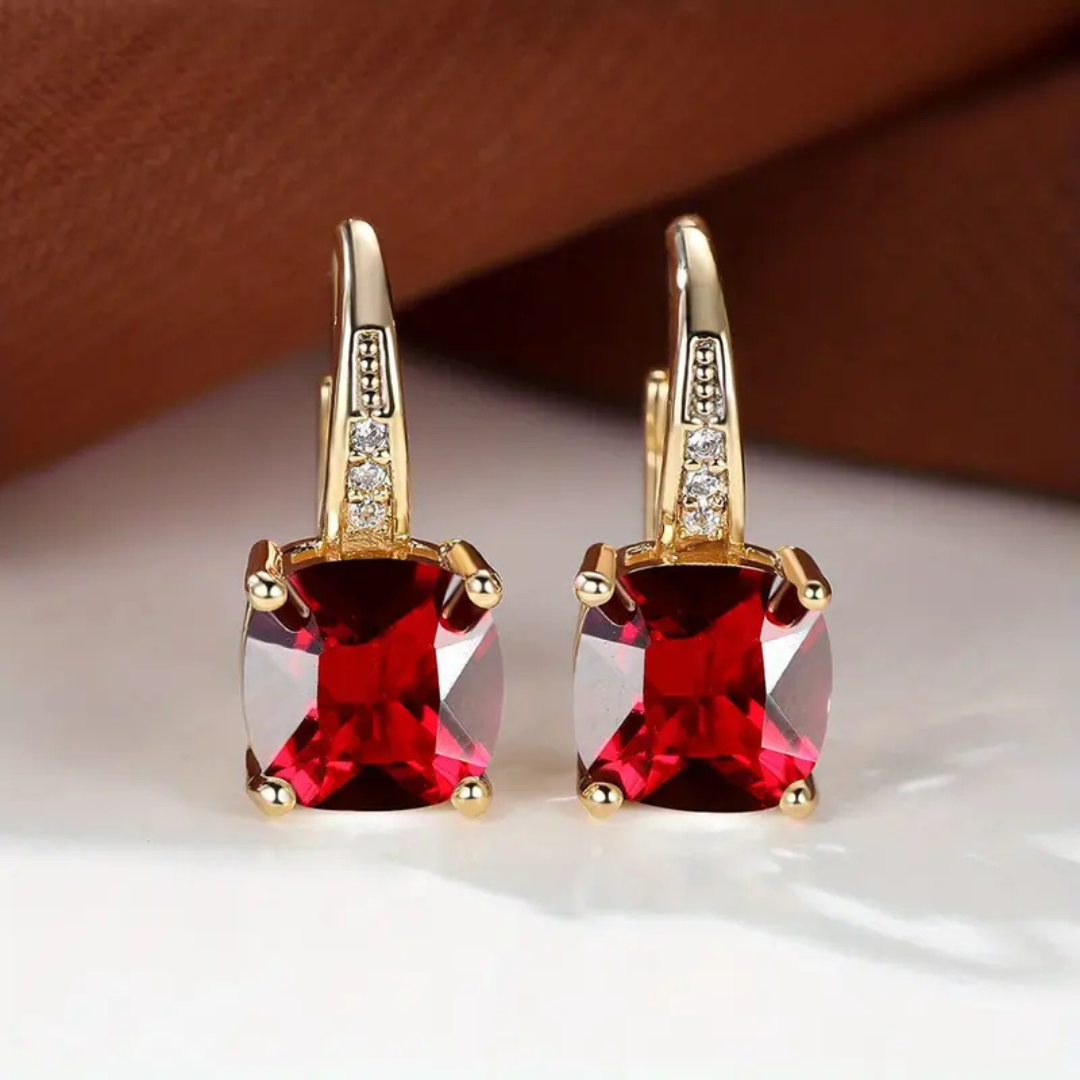 Boucles d'oreilles créoles élégantes avec pierres scintillantes