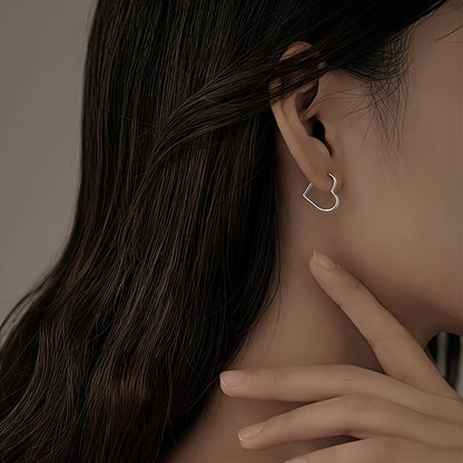 Boucles d'oreilles en forme de cœur en acier inoxydable doré