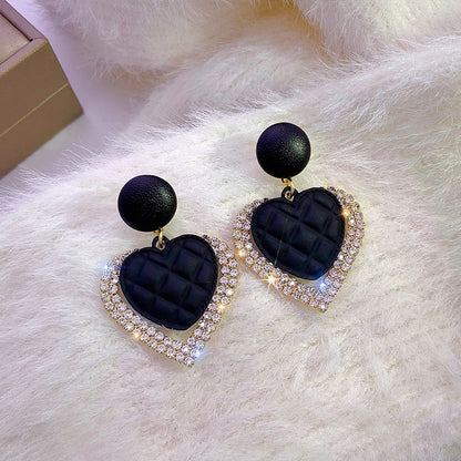 Boucles d'oreilles pendantes en forme de cœur noir en or