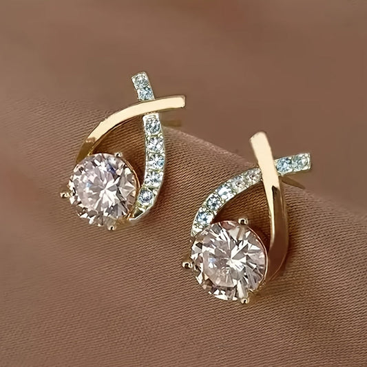 Boucles d'oreilles avec croix en or et zircon