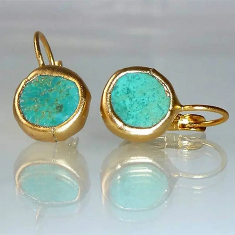 Boucles d'oreilles élégantes en or avec pierre turquoise