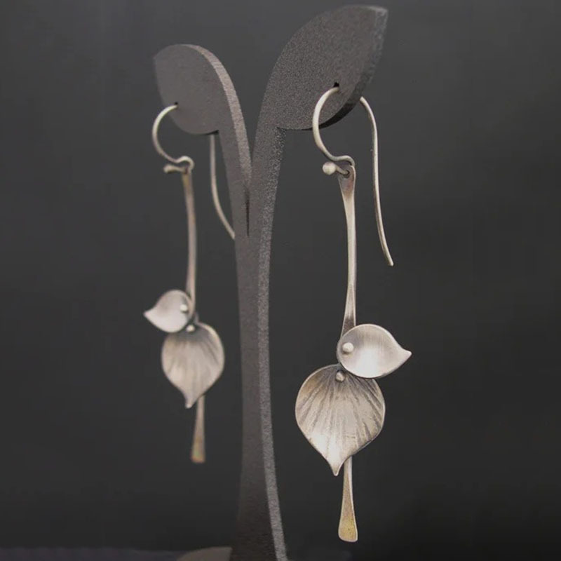 Boucles d'oreilles vintage dans le monde des feuilles en argent