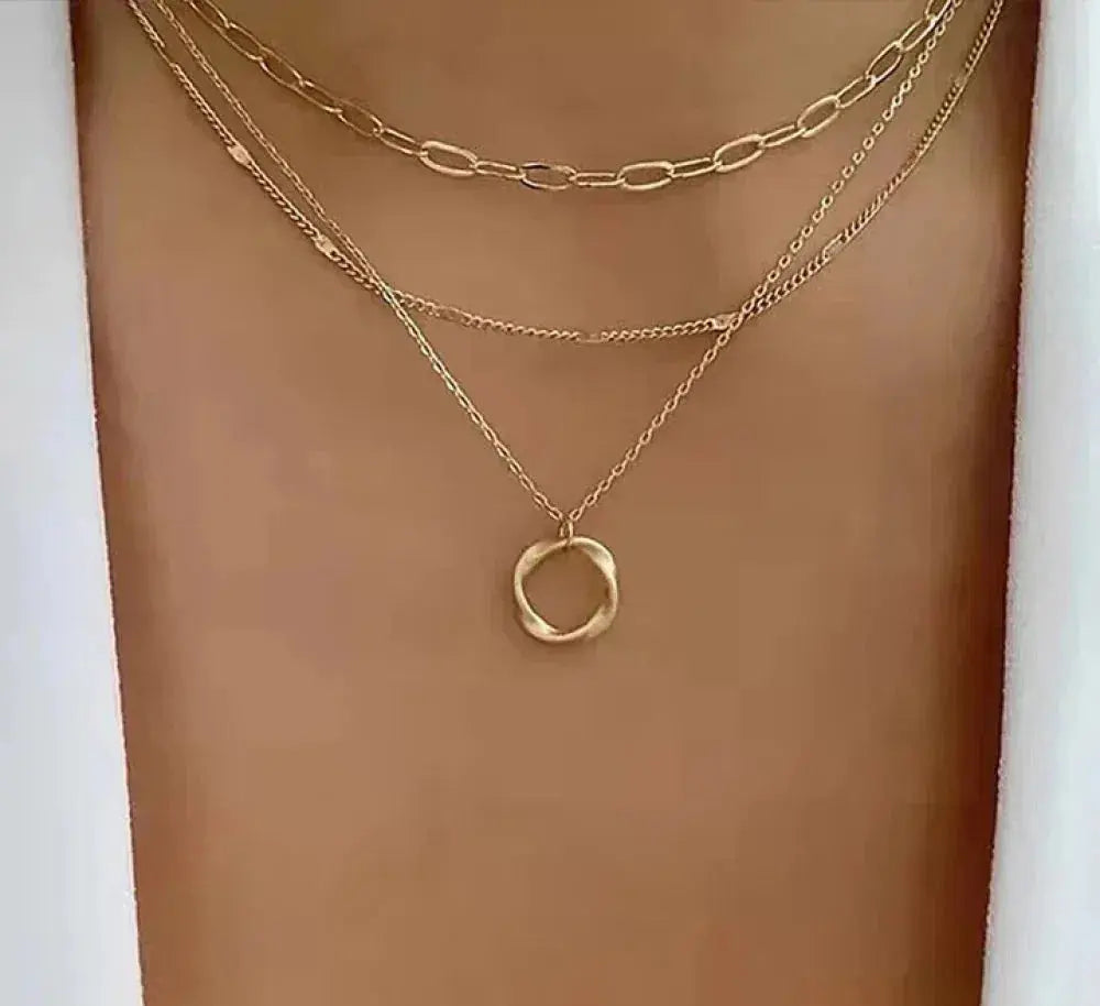 Collier vintage en chaîne dorée superposée et pendentif