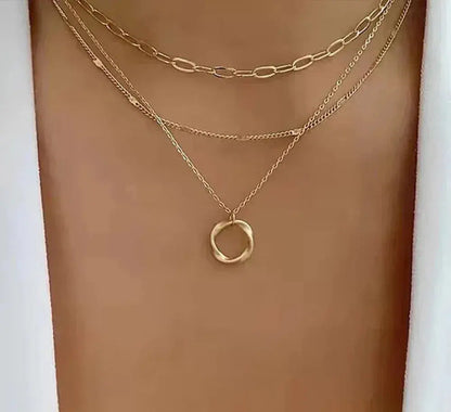 Collier vintage en chaîne dorée superposée et pendentif